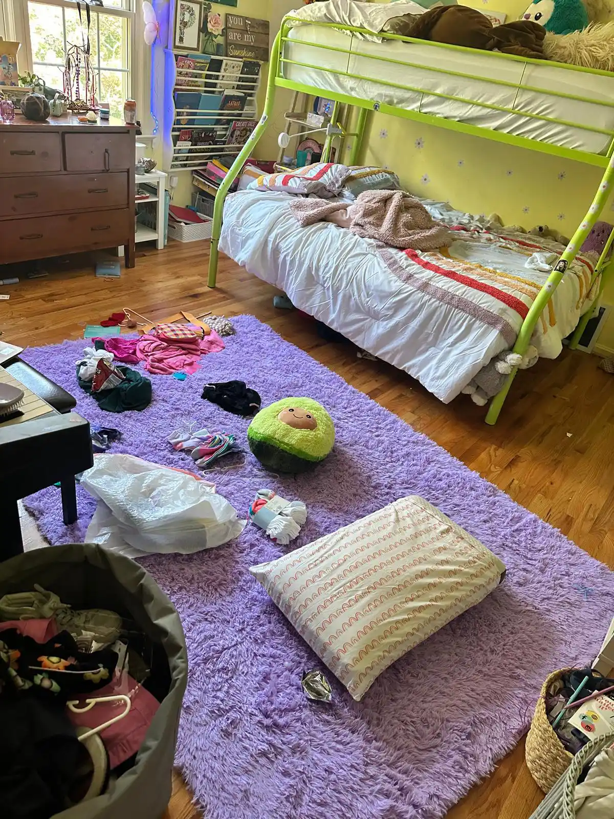 Cluttered bedroom before cleaning